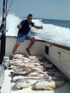 Fisherman with 2 big fish caught in Belmar