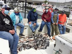 Four friends fishing in Belmar