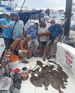Group of 6 people fishing at Belmar