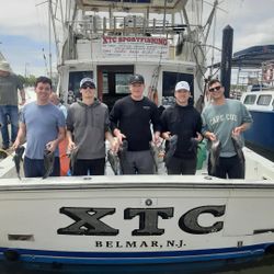 5 people fishing in Belmar, New Jersey