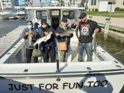 Four people fishing in Grasonville