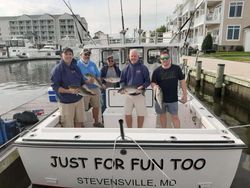 A group of 5 people fishing in Grasonville