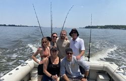 Group of 6 people fishing in Baltimore