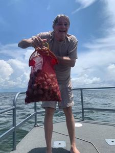 Lone fisherman reeling in catch in Florida