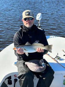 Trout landed on light fly gear
