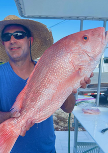 Skilled angler with a big catch in West Palm Beach