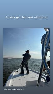Angler with fishing rod at Rock Hall location