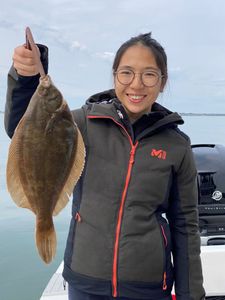 A winter flounder fish measuring 17 inches caught in MA