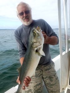 Fisherman reeling in a 23-inch catch in MA