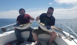 Two anglers with a catch of two large fish in Winthrop