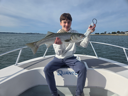 Nice striped bass caught using multiple techniques in partly cloudy conditions off Winthrop!