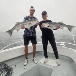Two striped bass caught fishing in Winthrop