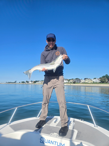Reeling in a big one with deep sea jigging in cloudy Winthrop!