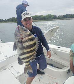 A fisherman with a sheepshead fish in Jacksonville