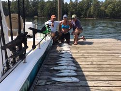 Three anglers enjoying a day of fishing at Lake Murray
