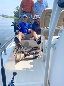 Couple fishing in SC with a big fish