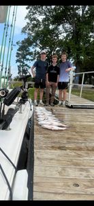 Three people fishing at Lake Murray