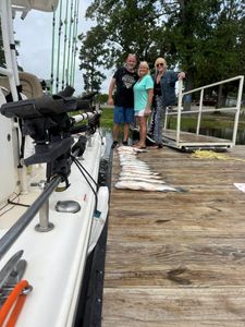 Three people fishing at Lake Murray