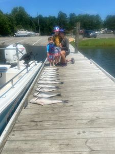 Three people fishing at Lake Murray