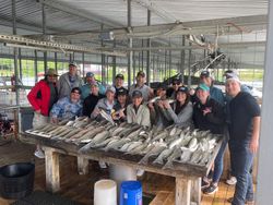 A group of 16 people fishing in TX