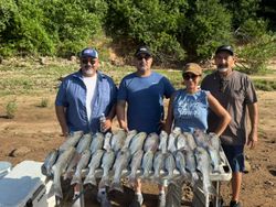 4 people fishing for 2 fish in TX