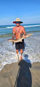 Person fishing at New Smyrna Beach