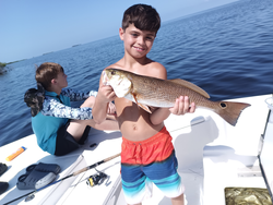 Huge redfish landed at Bayport Park using the best jigging and trolling techniques!