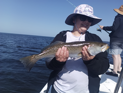 Catching the big one out on the open sea.