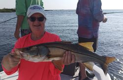 A person fishing for a snook in Florida