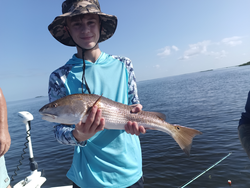 Redfish love clear days with a chance of storms!