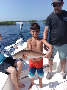 Jigging for redfish pays off at Bayport Park!
