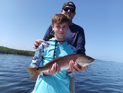 Reeling in the best redfish action under clear skies in Weeki Wachee!