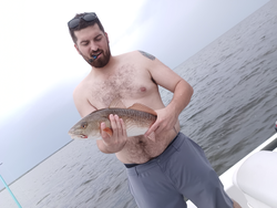 Cloudy skies can't dampen the thrill of redfish action in Weeki Wachee!