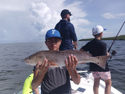 Clear skies and hot redfish action in Weeki Wachee!