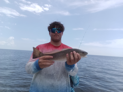 Cloudy skies and storms can't stop the best redfish action in Weeki Wachee!