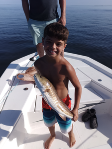 Hooking reds in Weeki Wachee's clear waters with diverse techniques!