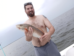 Stormy skies can't stop the best redfish action in Weeki Wachee!