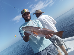 Storms brewing, but the redfish are biting in Weeki Wachee!