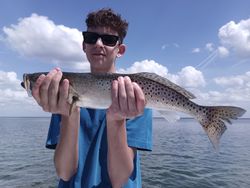 Two spotted weakfish, 24 inches long, caught while fishing in Weeki Wachee