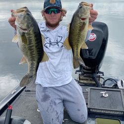 Two largemouth bass caught while fishing on a boat in Fort Worth TX