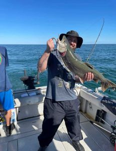 Angler holding a 23-inch fish in Pulaski