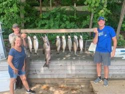 Anglers with a successful fishing trip in Pulaski, catching 5 big fish