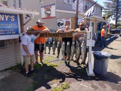four people enjoying fishing and hunting in new york