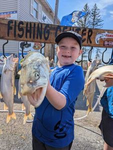 Three fish caught in NY while fishing and hunting
