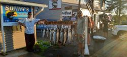 Three people enjoying a fishing and hunting adventure in Pulaski