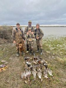 Four people fishing in Port O'Connor
