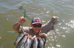 Two fishing or hunting outdoors scene in TX