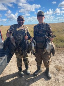Two people fishing in TX