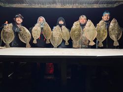 10 summer flounder and southern flounder caught in Galveston fishing