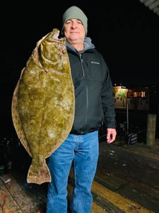 A person fishing in Galveston
